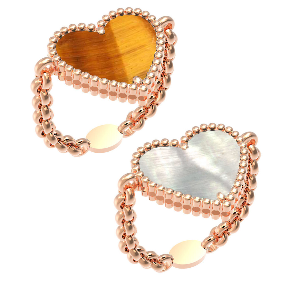 Кольцо из золота c тигровым глазом и перламутром