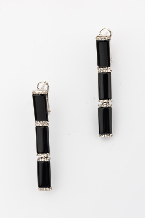 Серьги из белого золота c бриллиантами и ониксом