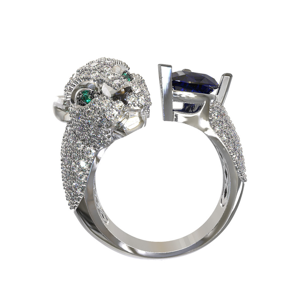 Кольцо из белого золота c бриллиантами, сапфиром и изумрудом