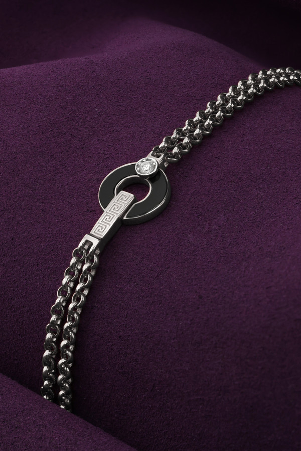 Браслет из белого золота c бриллиантами и ониксом